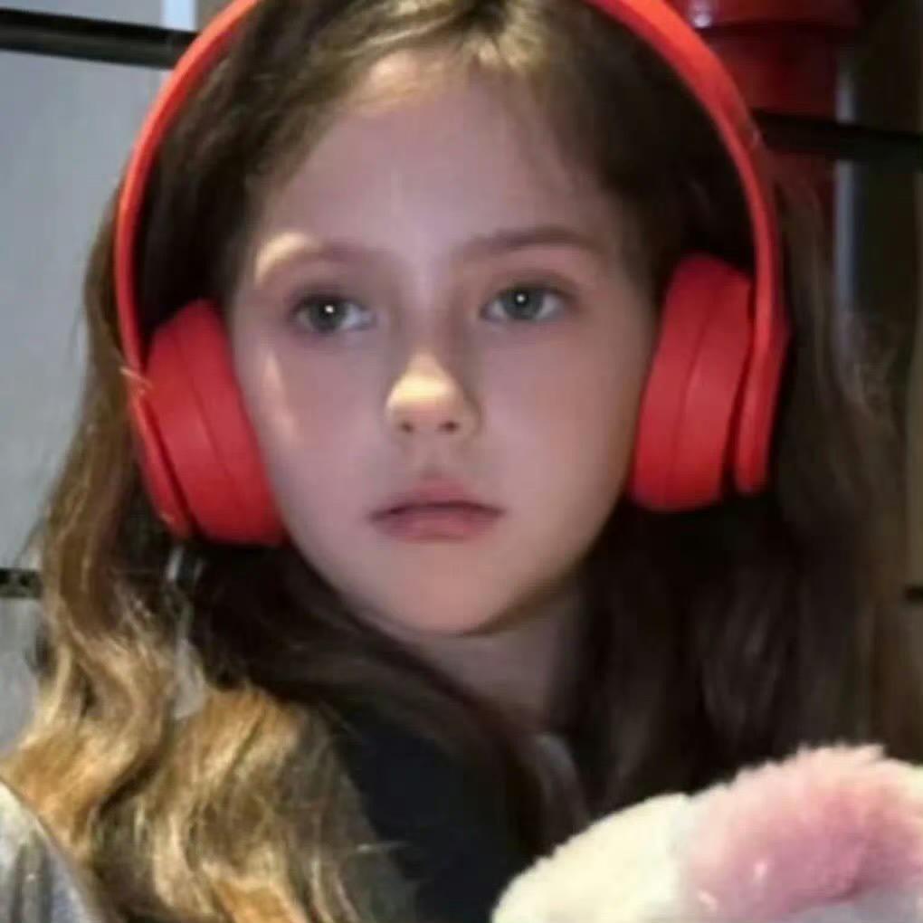 L.