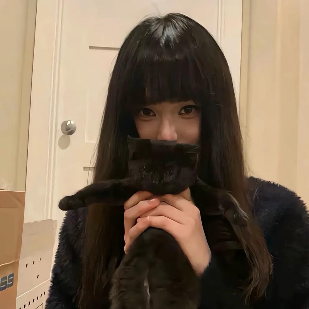 T.