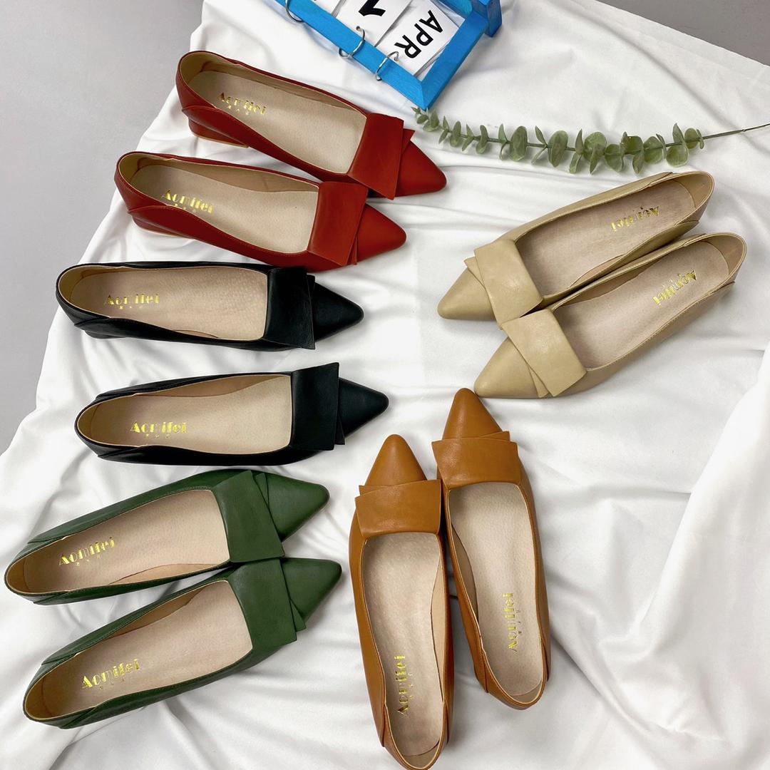 拾里手工女鞋工厂店