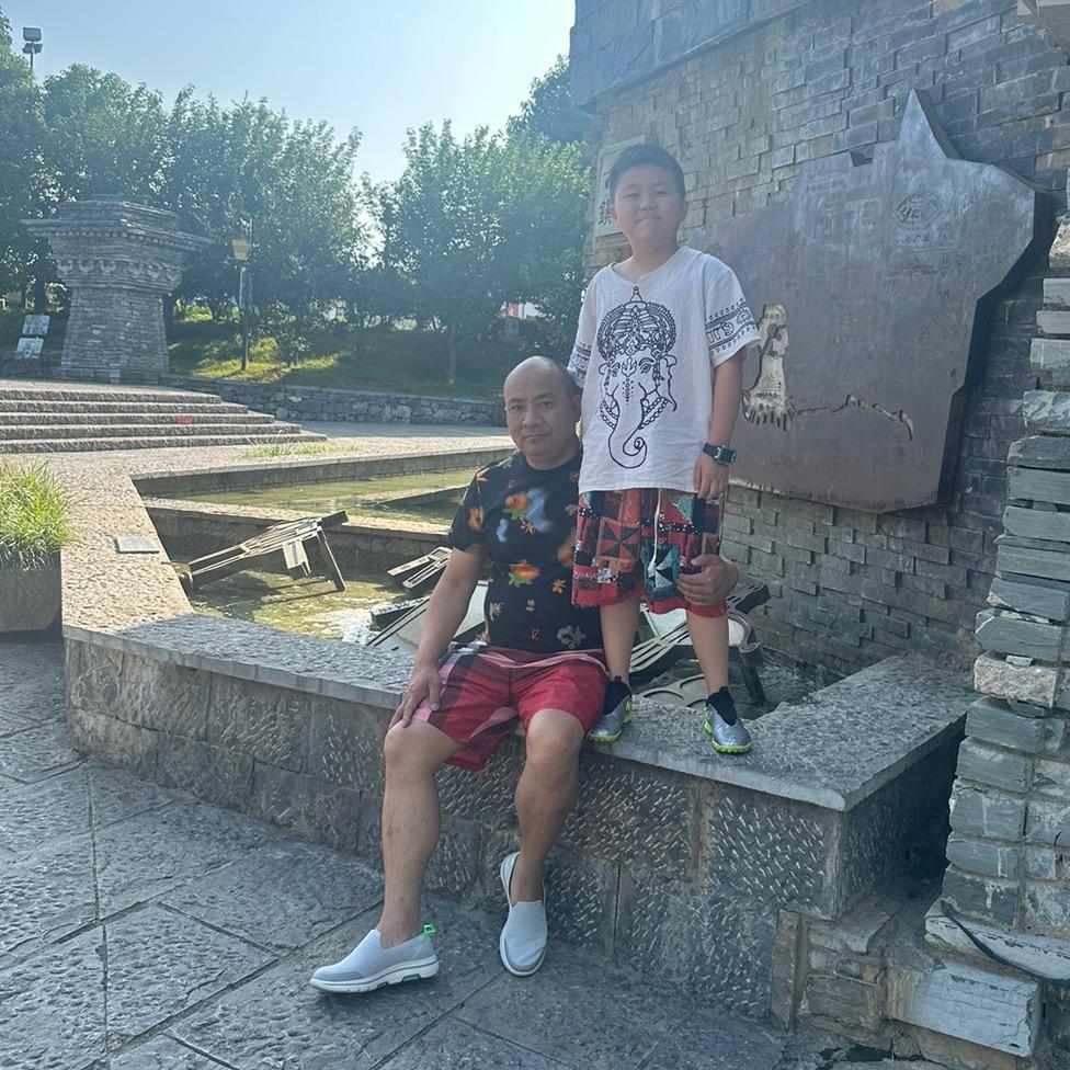 李三