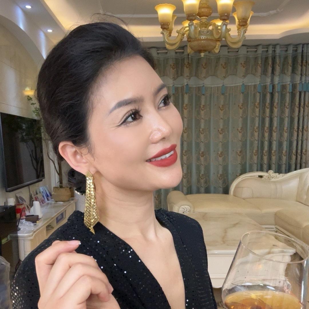 张精致
