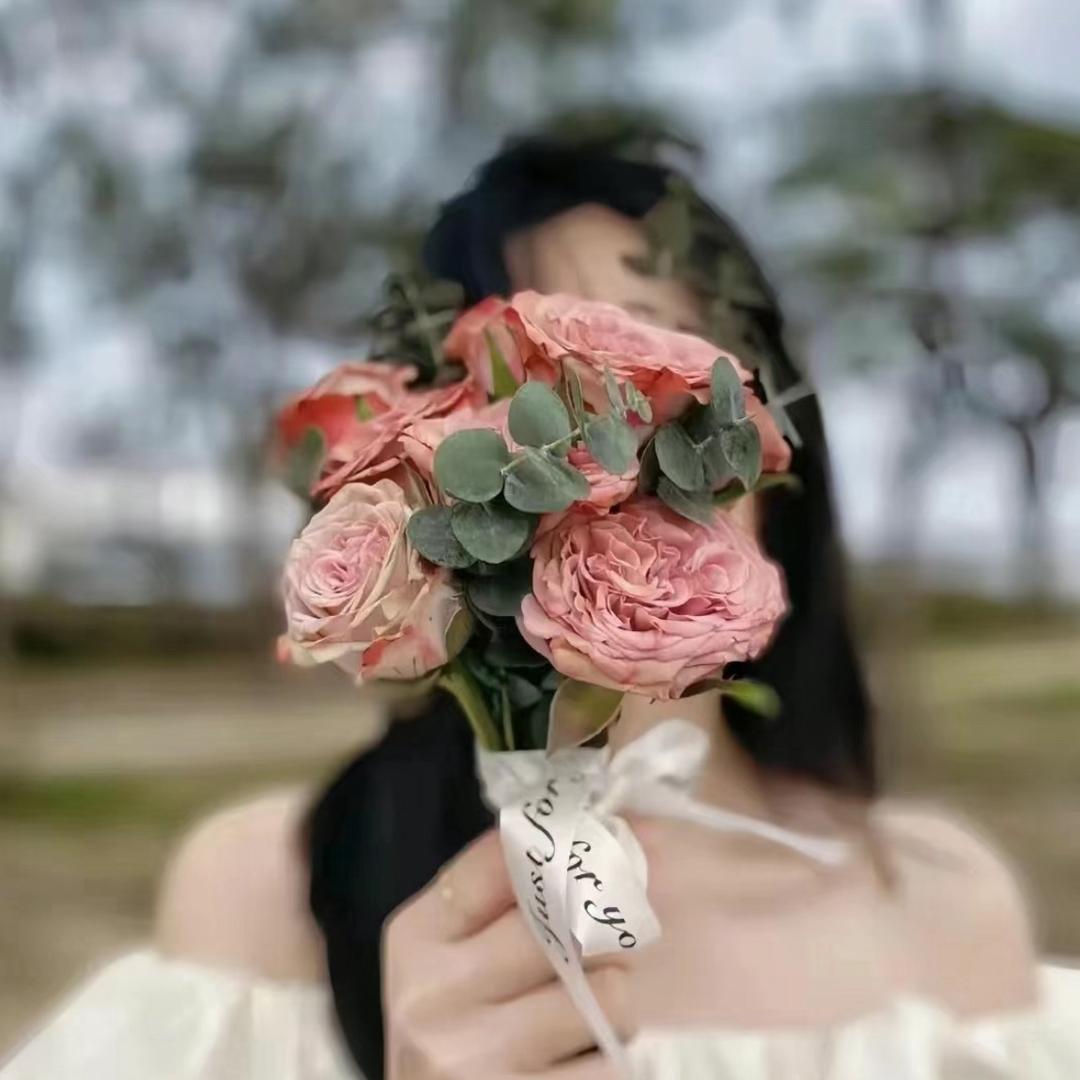 张～