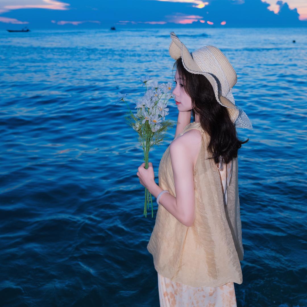 海欣.