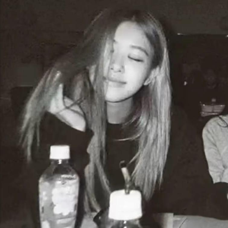 T.