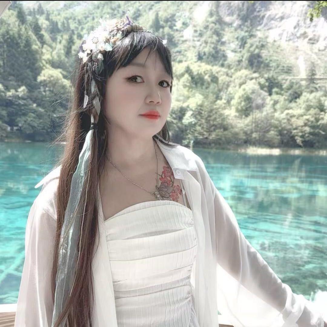 @空谷幽兰。，小英