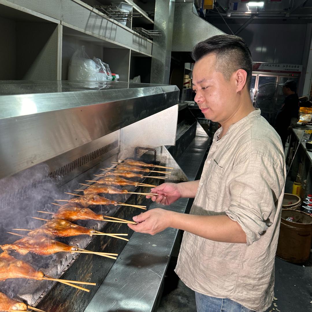 烤鸡腿的阿羊哥