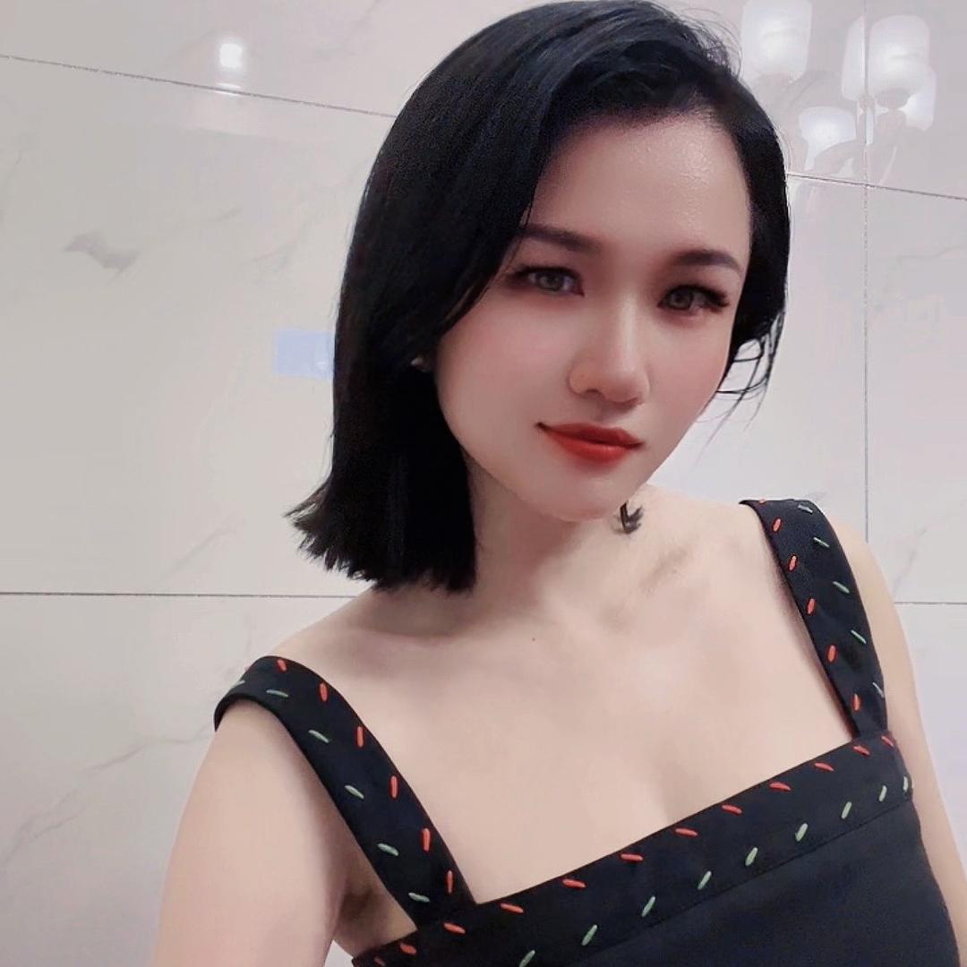 丽.