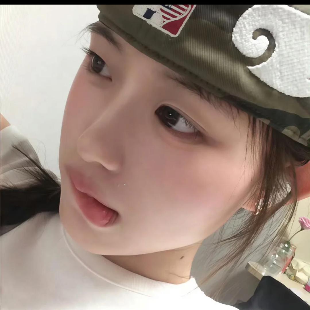 立 日 心^