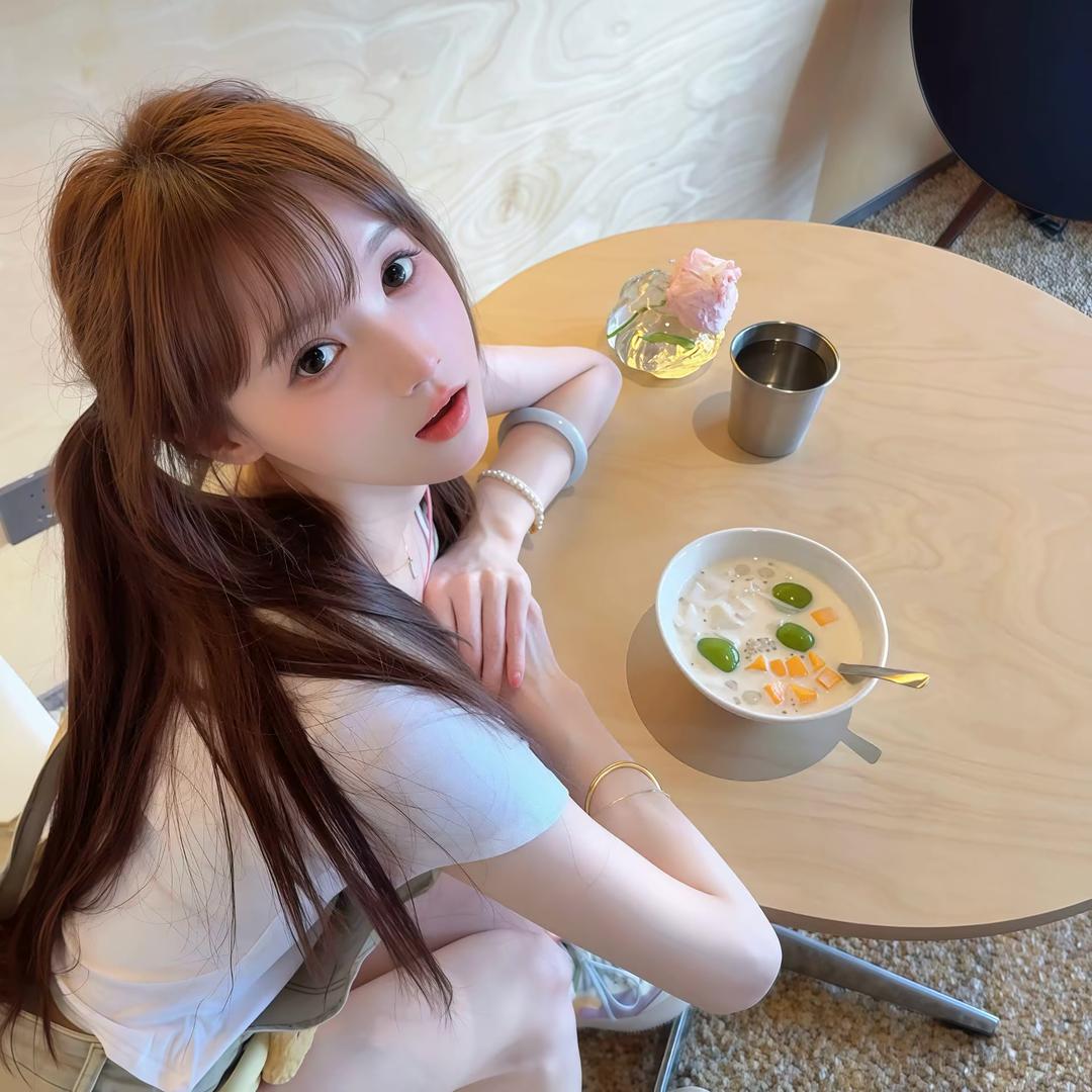 七七^
