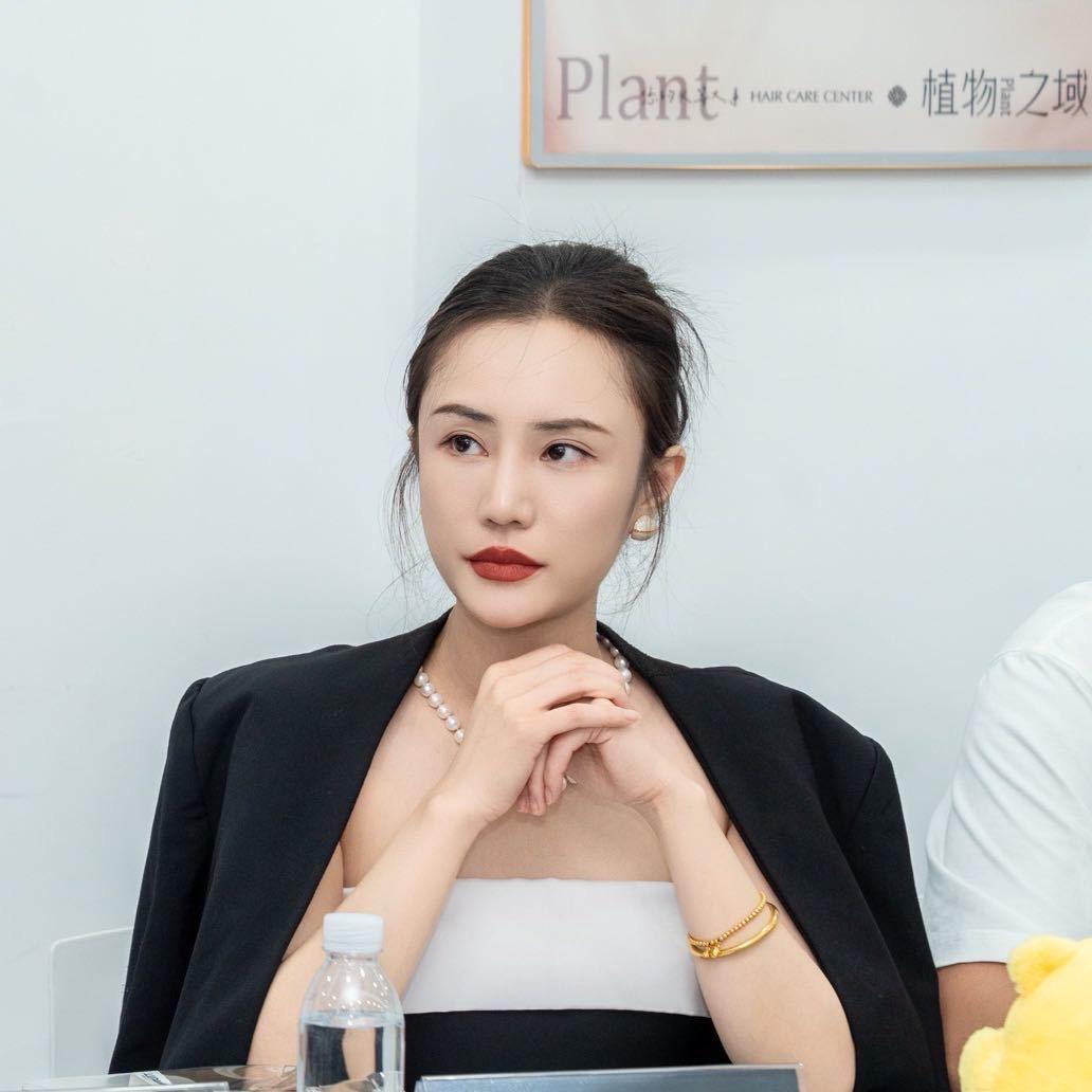 新美业  顾汤莉
