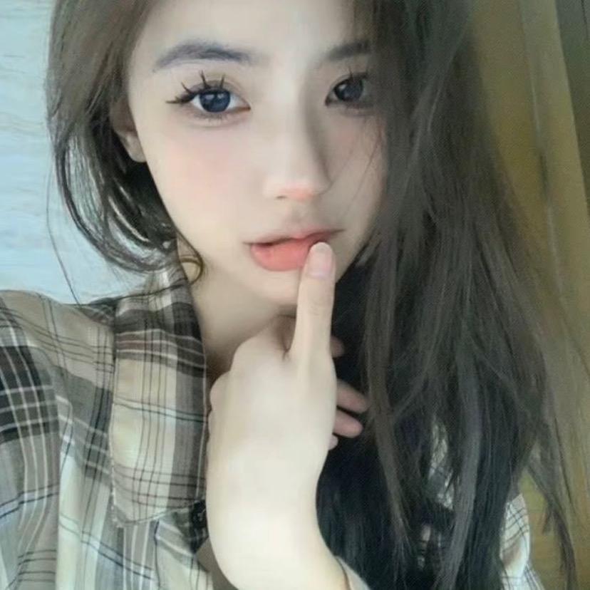 T.