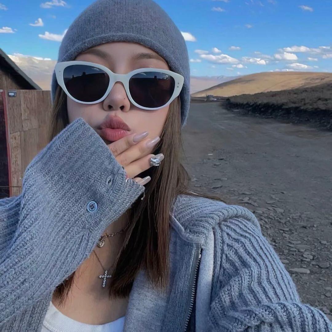 -77