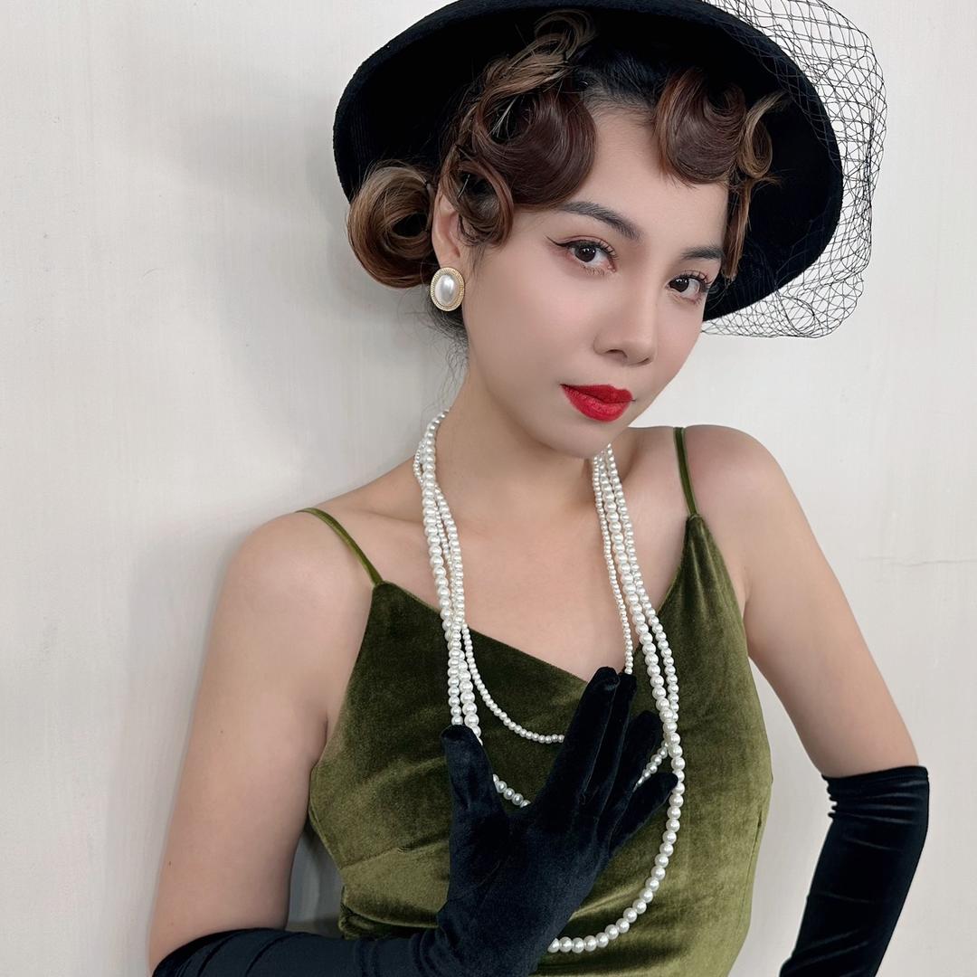 何思谕（西关大小姐）
