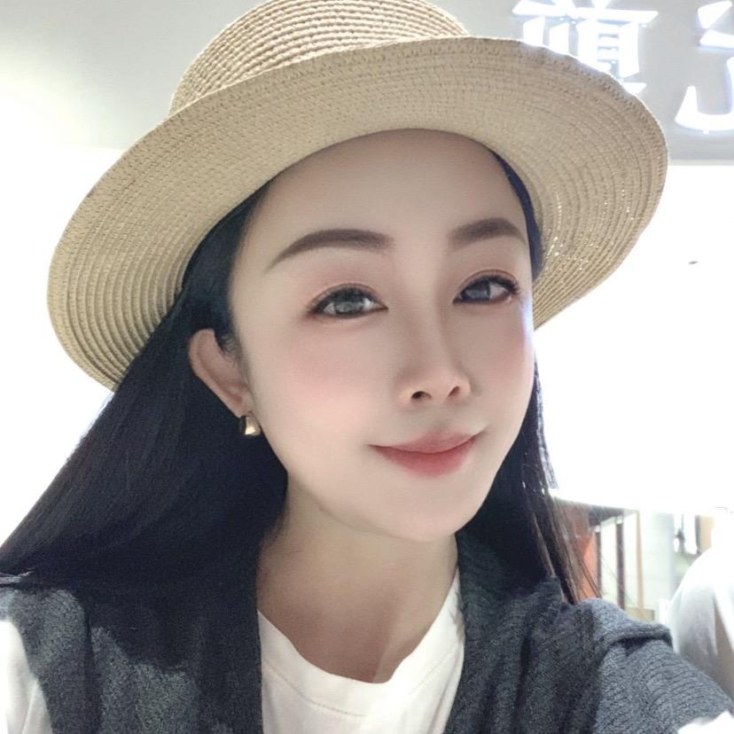 勐腊县，街心花园对面（魅丽女士服装店）
