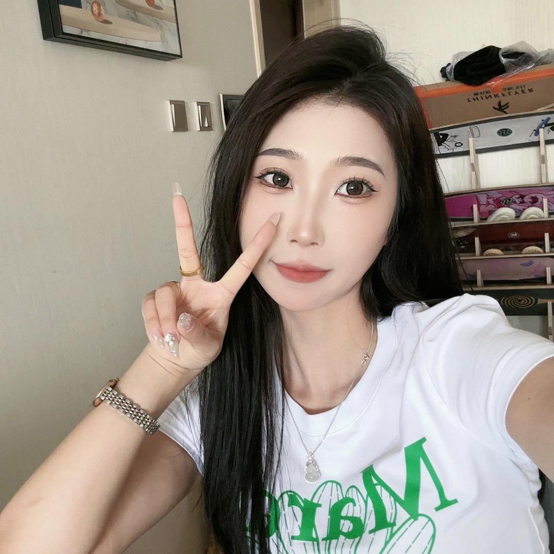 娜子.