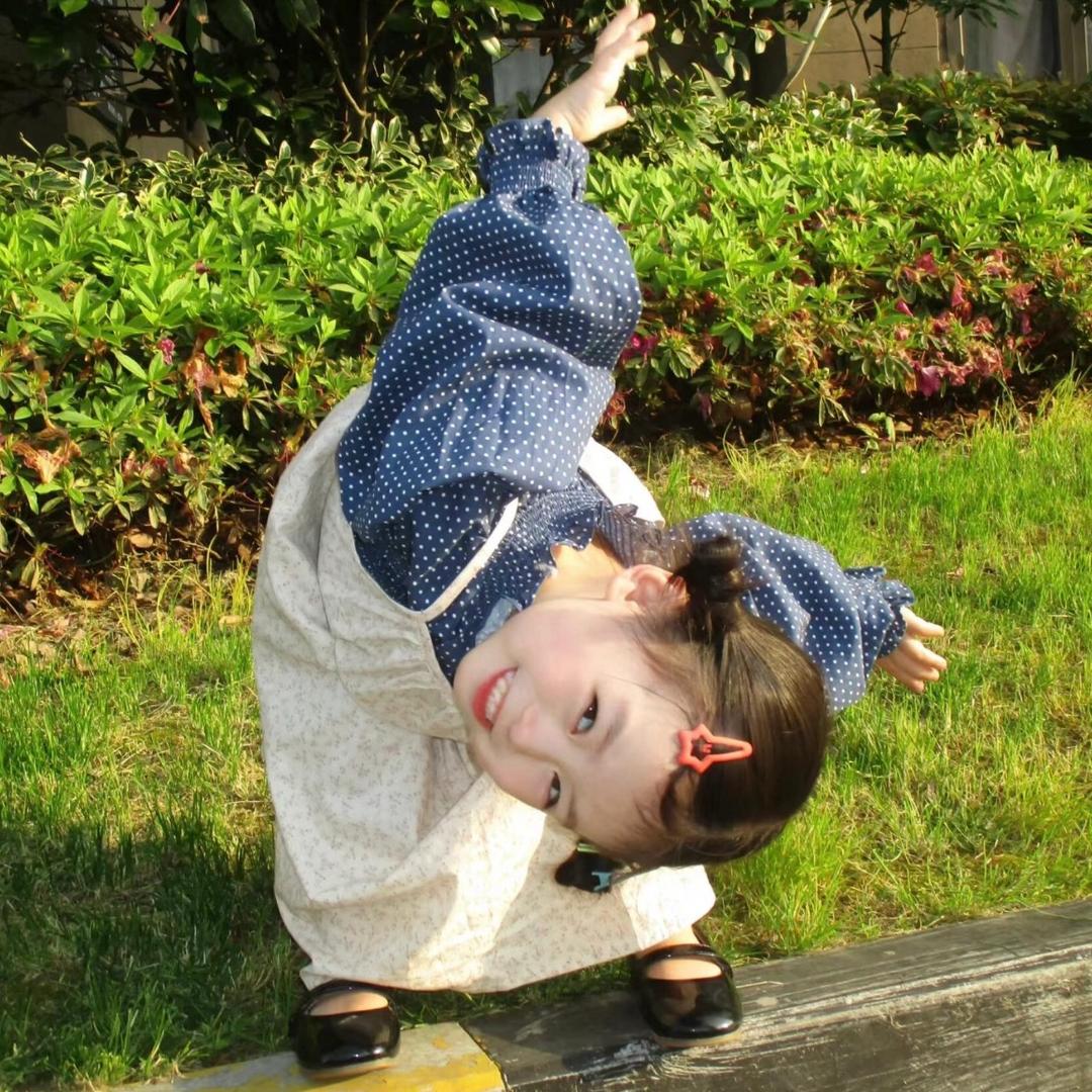 J.