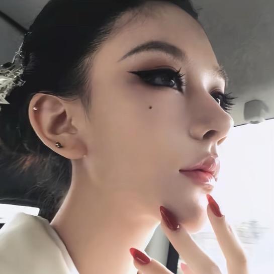 E.