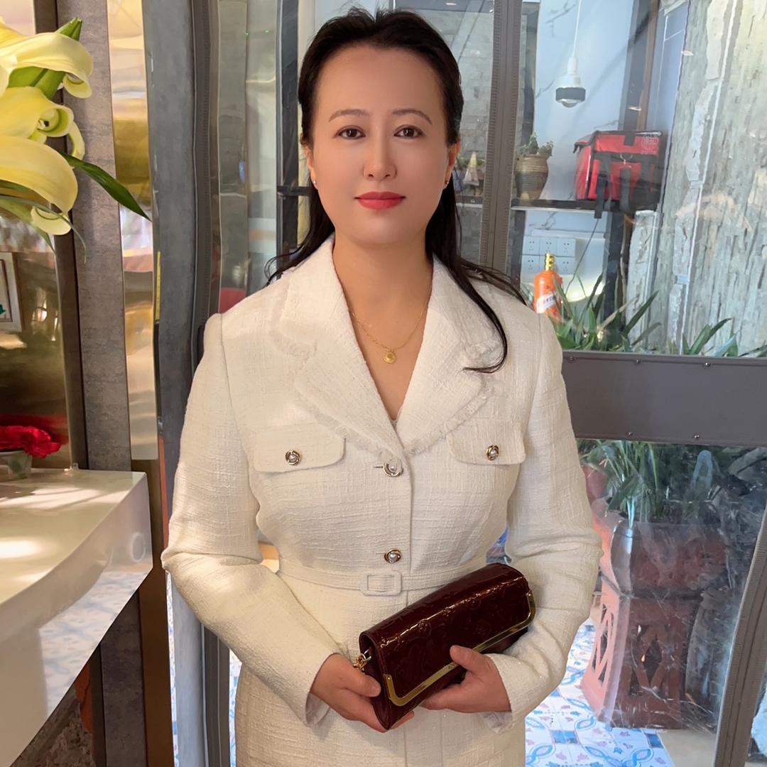 鸽子粮缘酒店老板娘