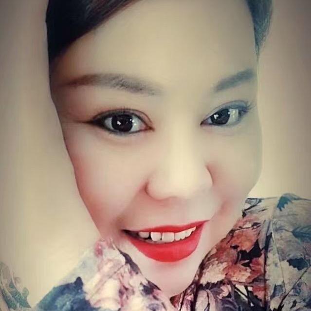 张 英