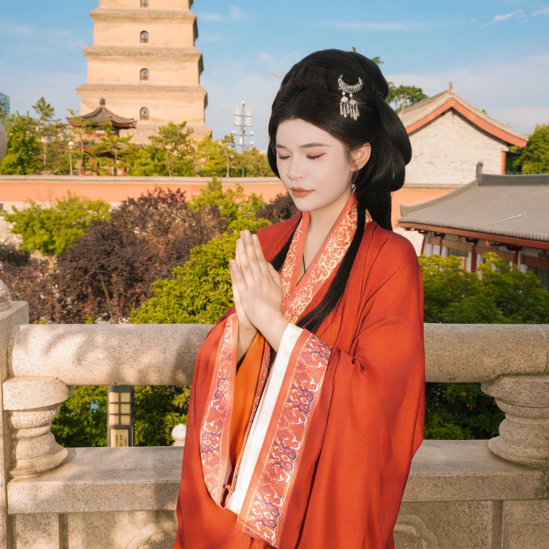 妞i