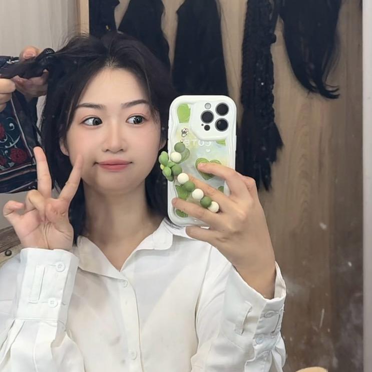 眉山意术发型设计徐久久