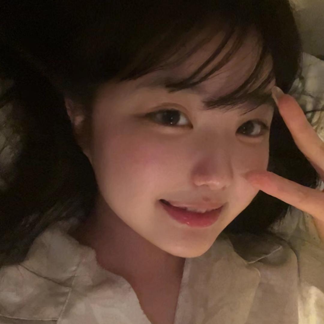 七七