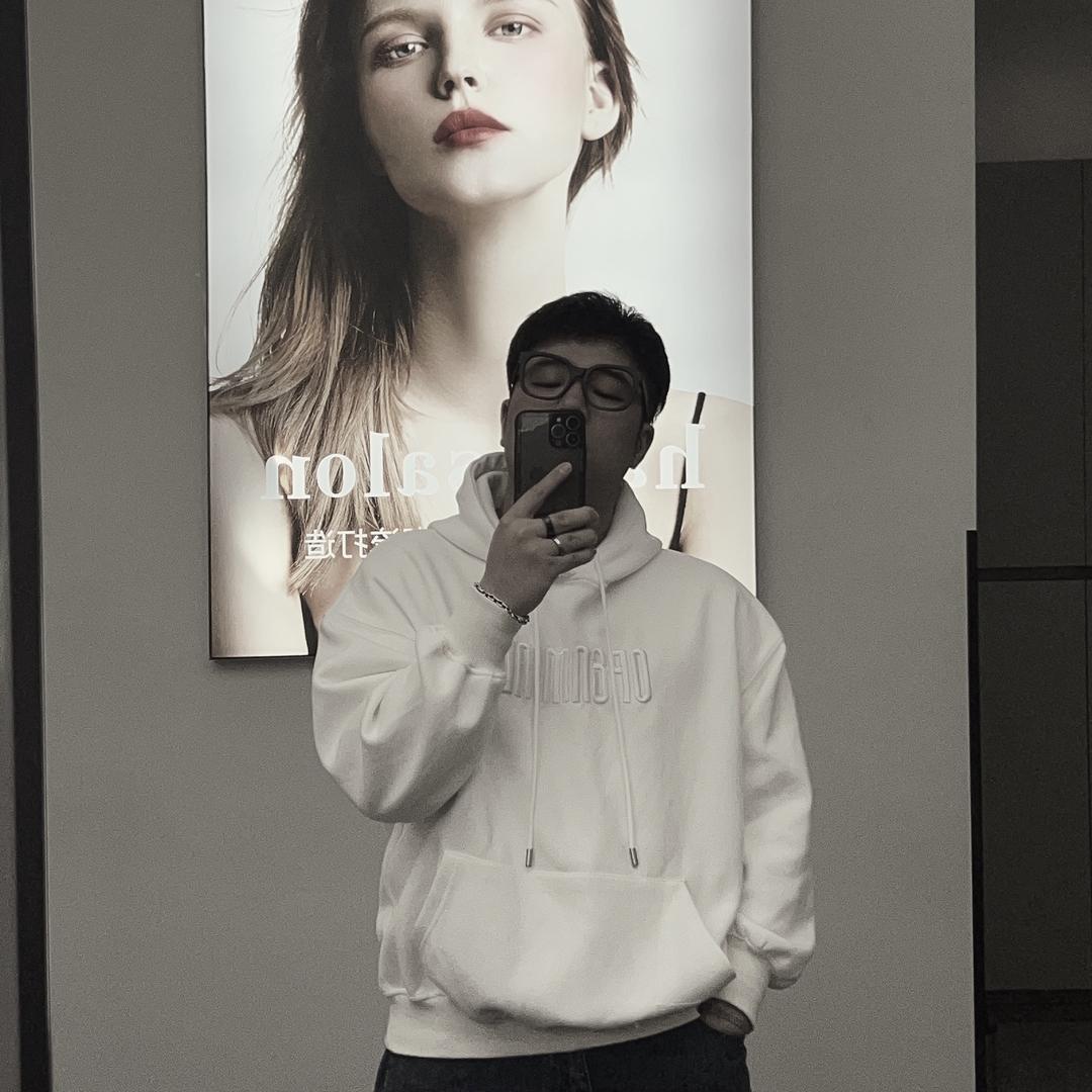 T.
