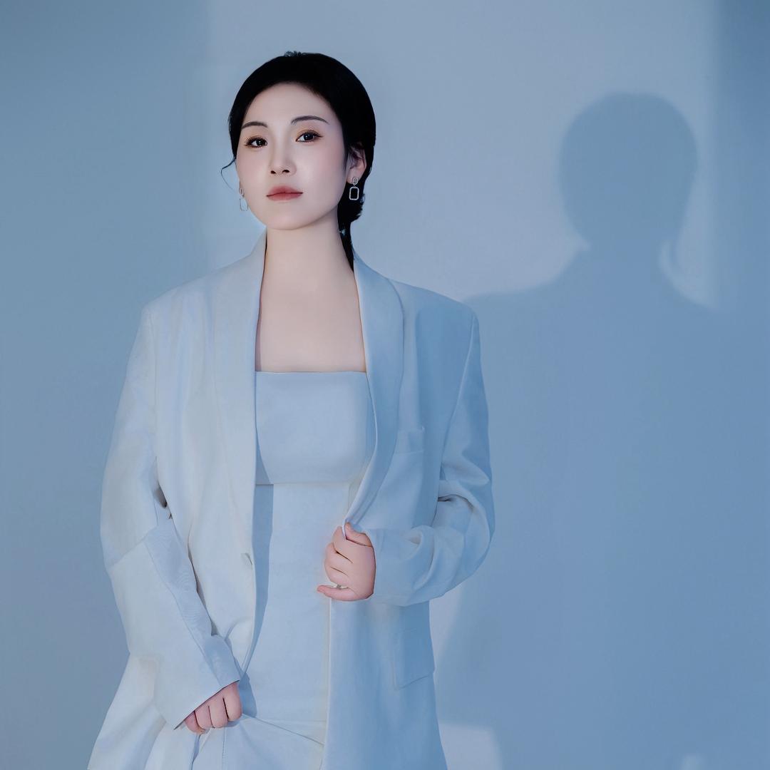 称勾美业张小菲