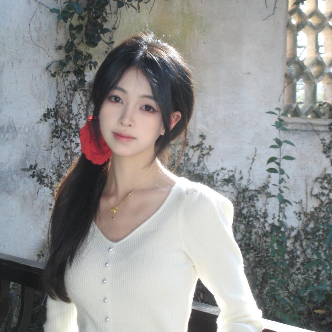 姜念.
