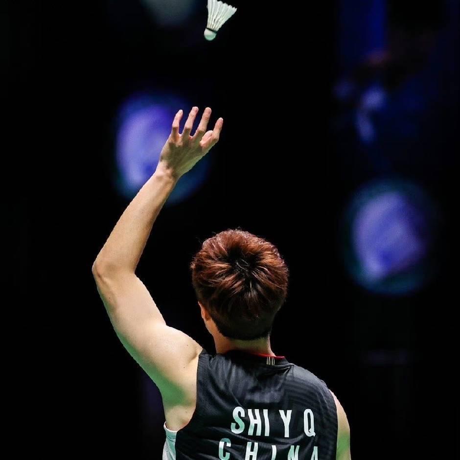 🏸