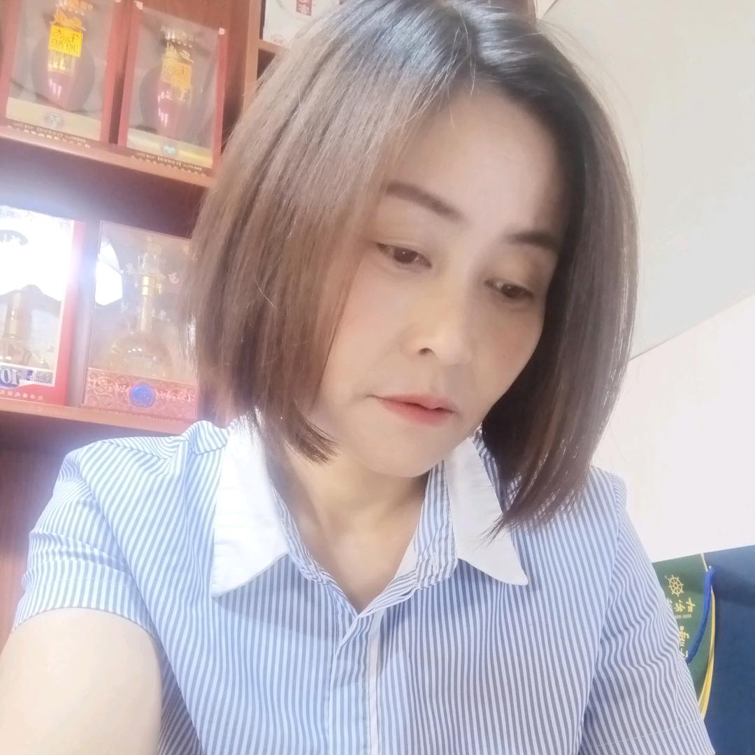 淡然一笑
