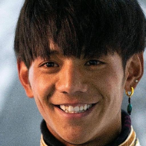理塘丁兲