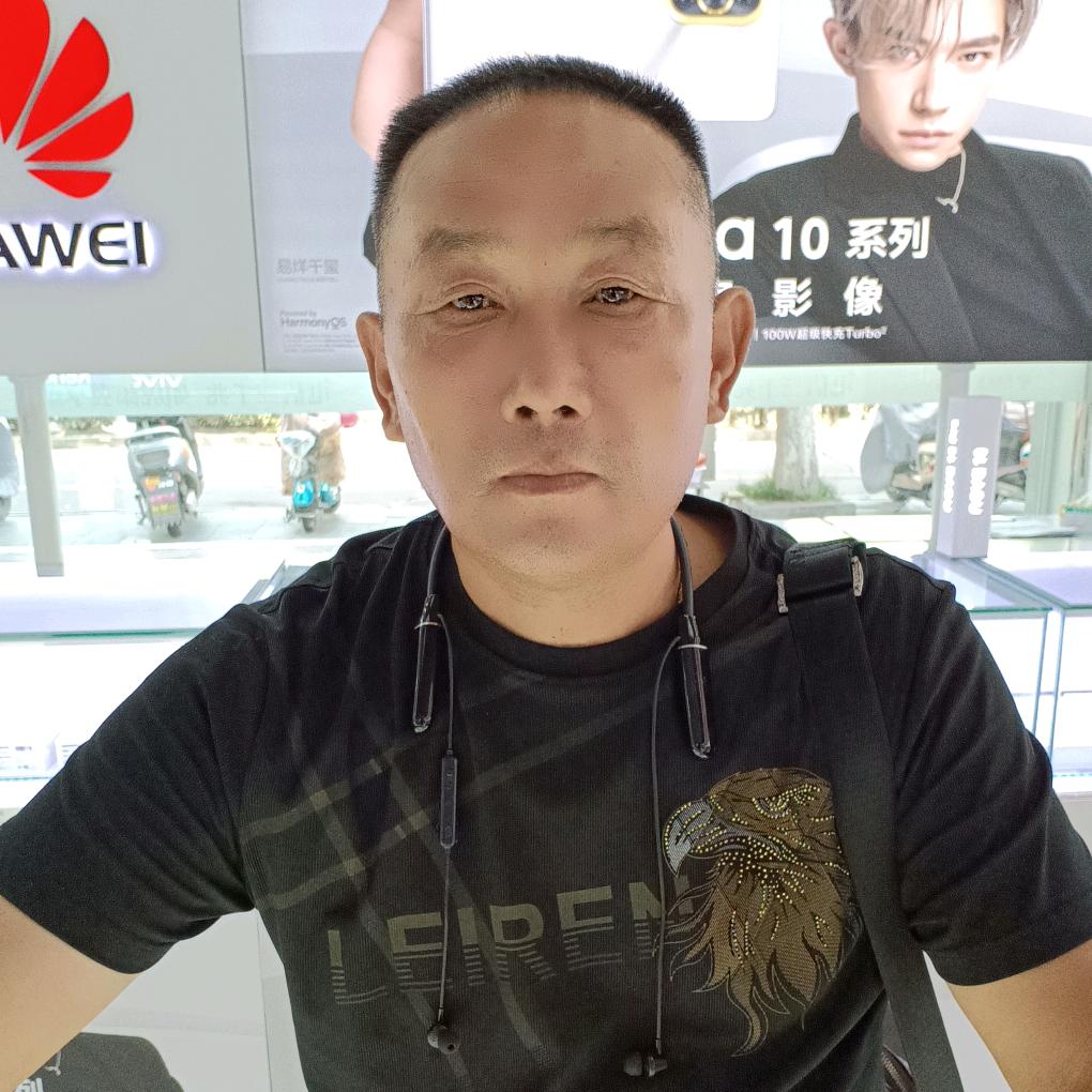 高士明