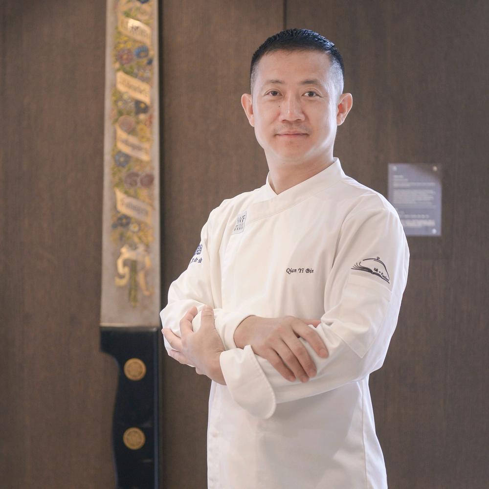 钱以斌