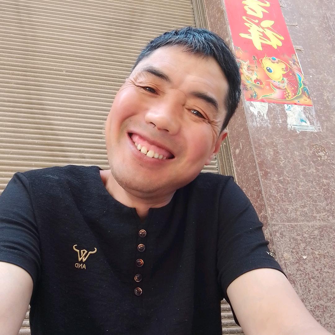 阿贵.