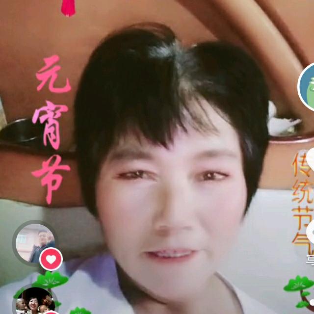 张学英