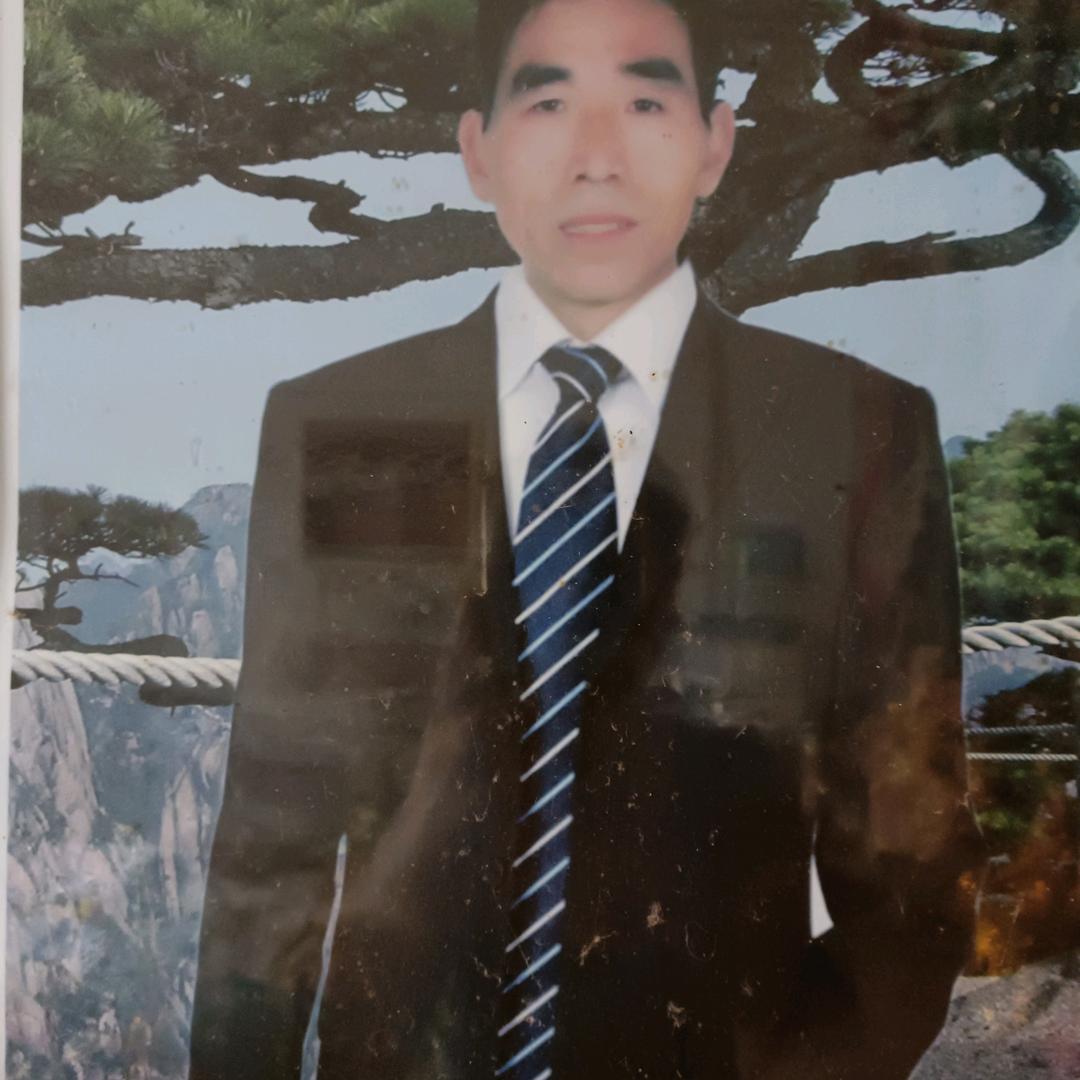 老张。