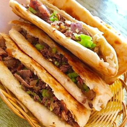 驿城区三顾毛驴火烧特色店