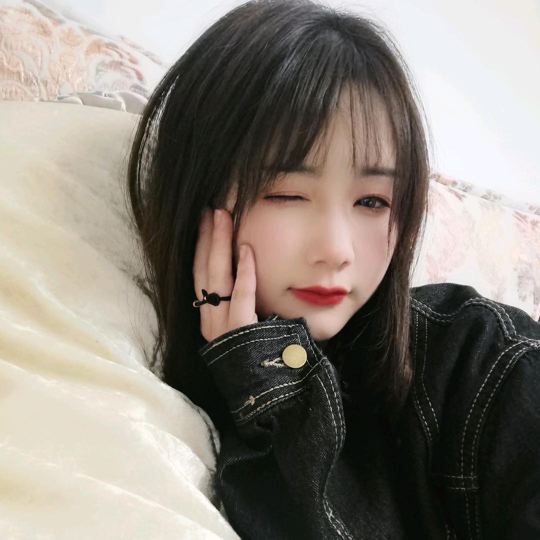 T.