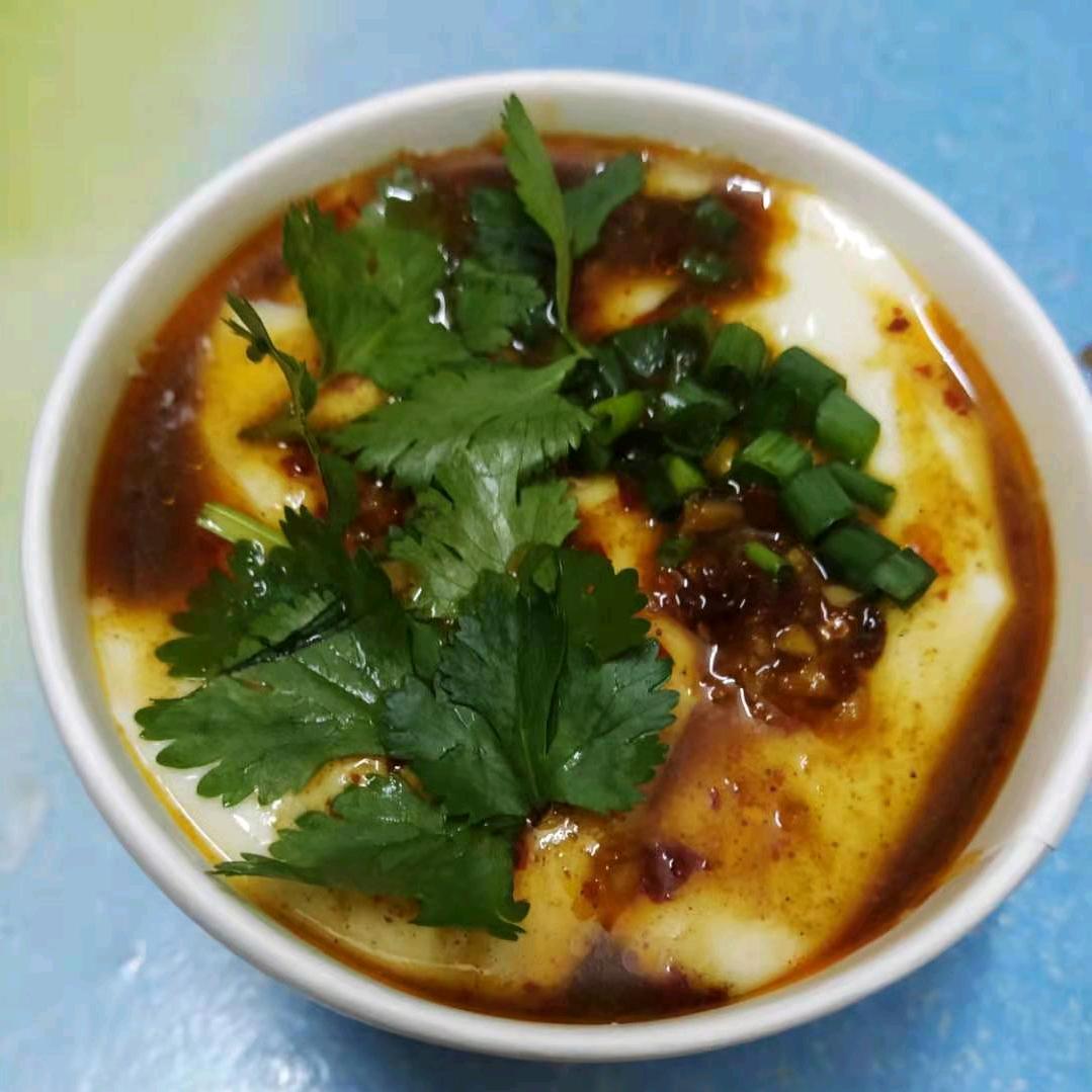 广西花鸟交易市场谭姐自煮红糖甜品