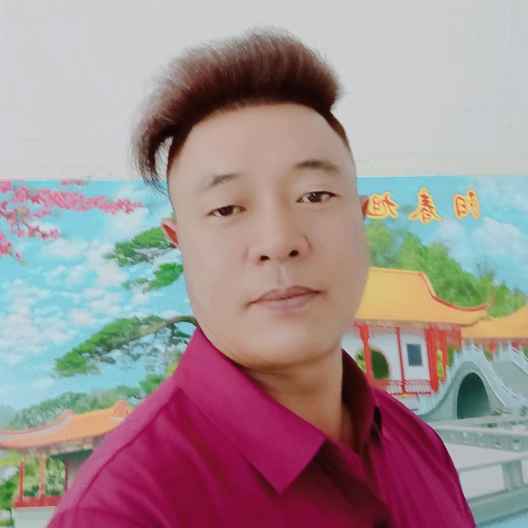 張哥