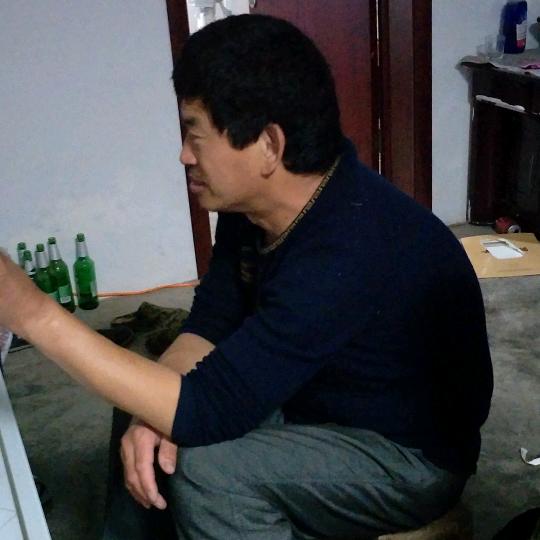 成哥.
