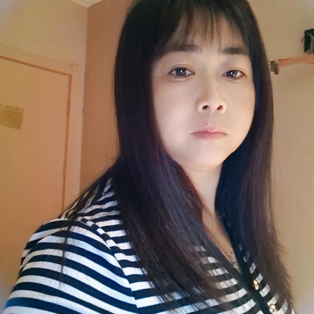 黄明美