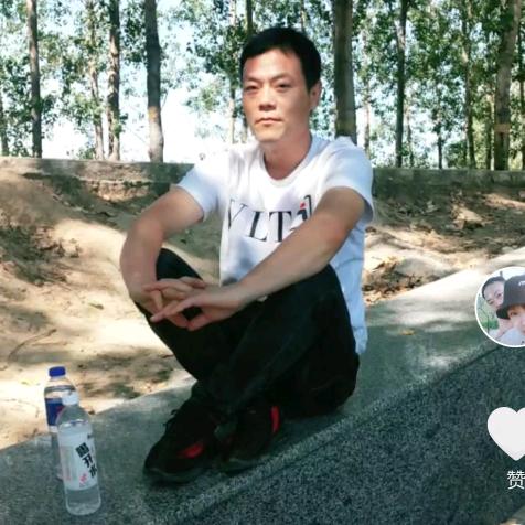 老张