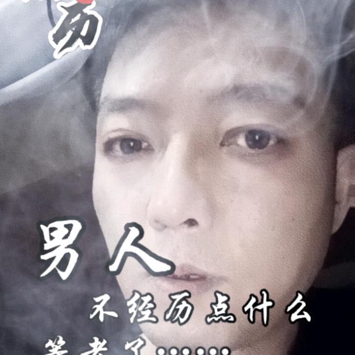 張  三