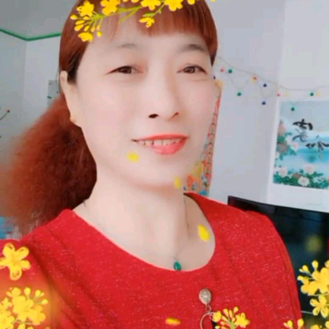 淡然一笑