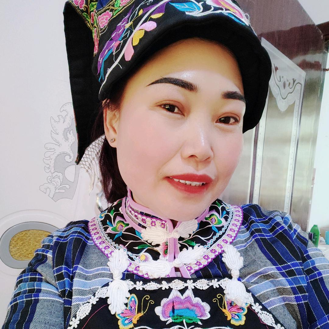 何姐