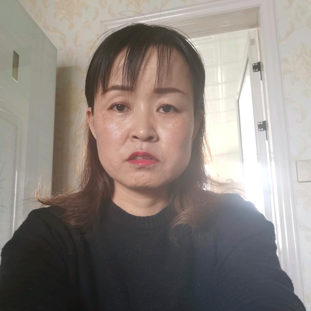 七七