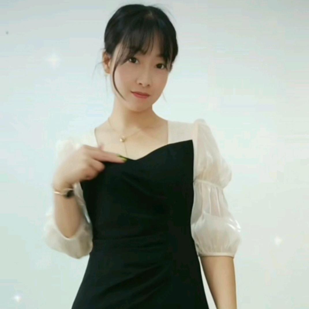 廖君