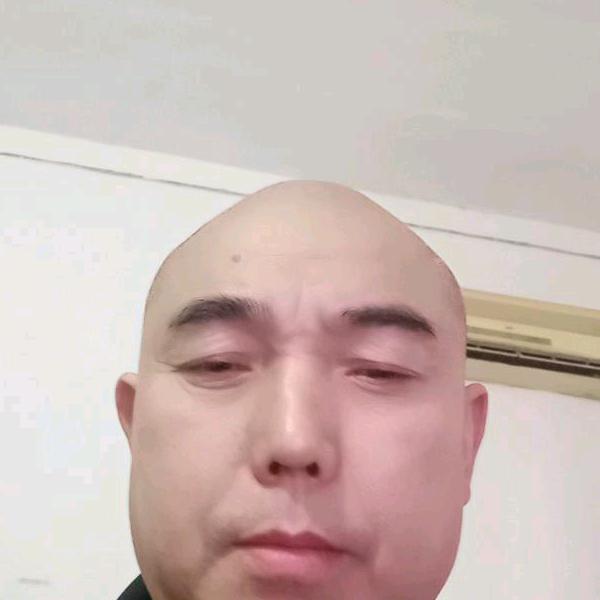 万老七